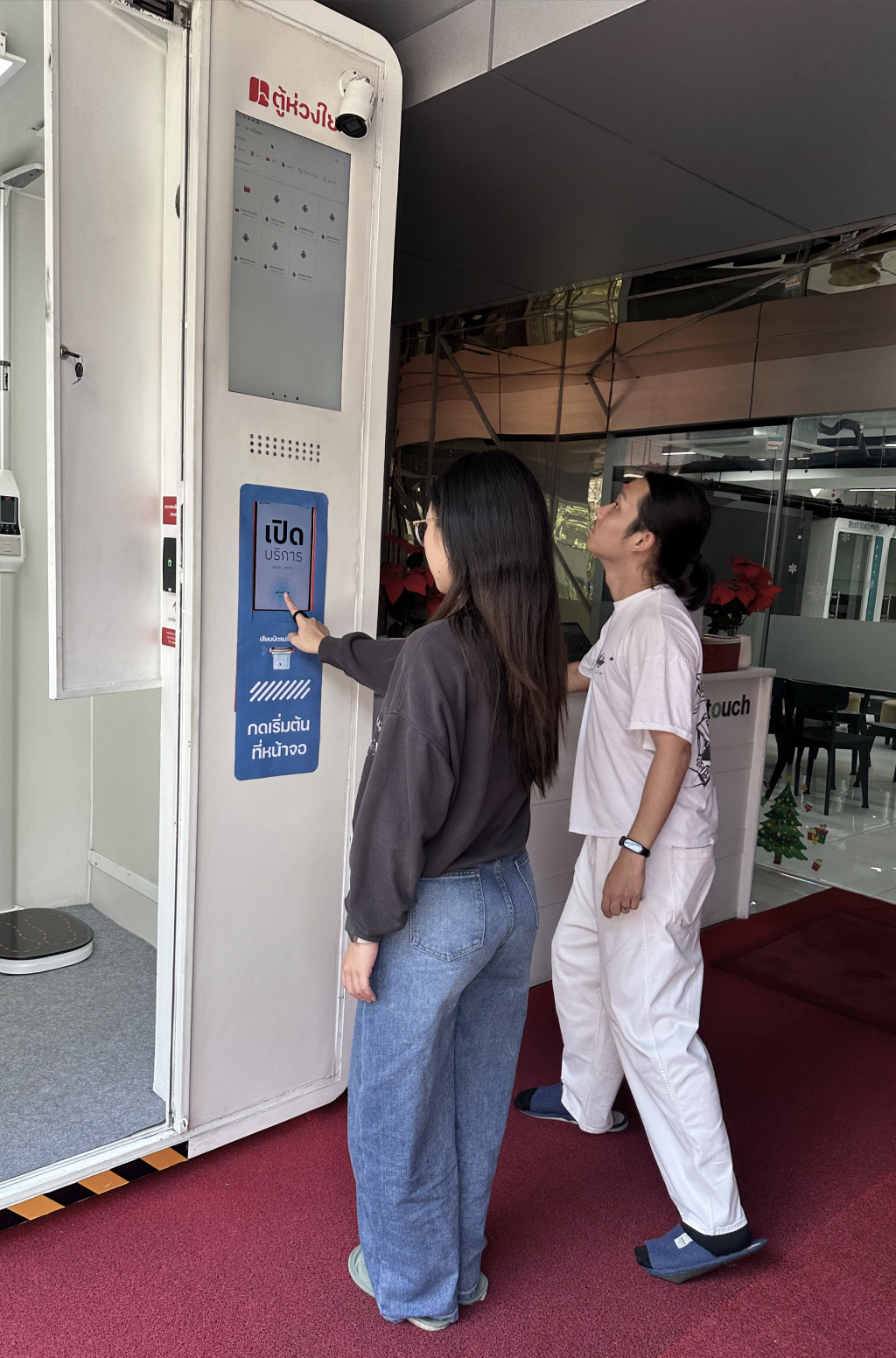 Team observing users at the Health Cabin entrance