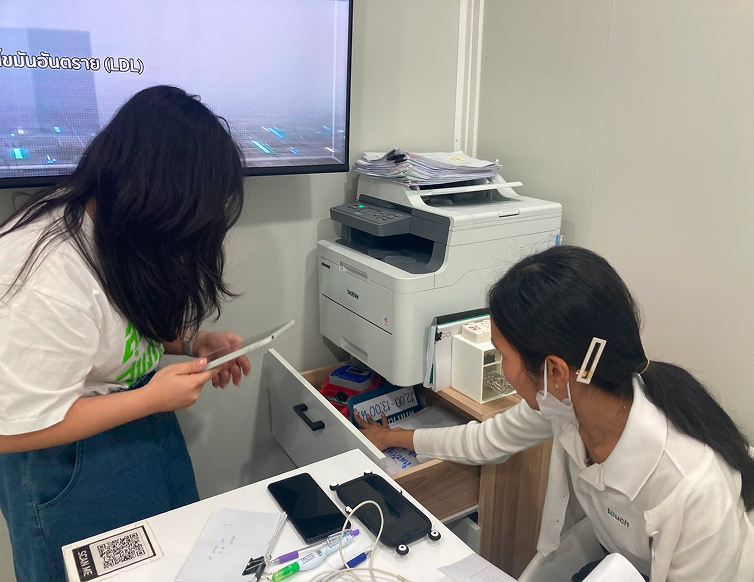 Observing staff handling patient records at the front desk