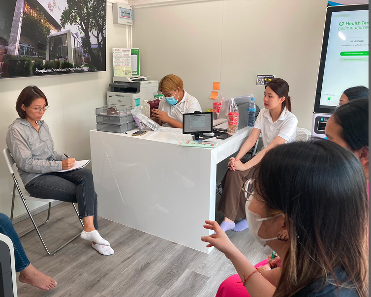 Interviewing staff and patients at the Health Tech counter